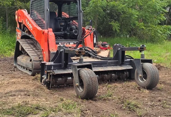 Power Rake / Soil Conditioner attachment on a Kubota SVL-75